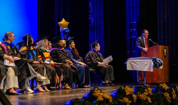 Photo: Speaking at the University of Michigan Latinx graduation ceremony.